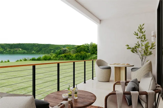 a view of a chairs and table in patio