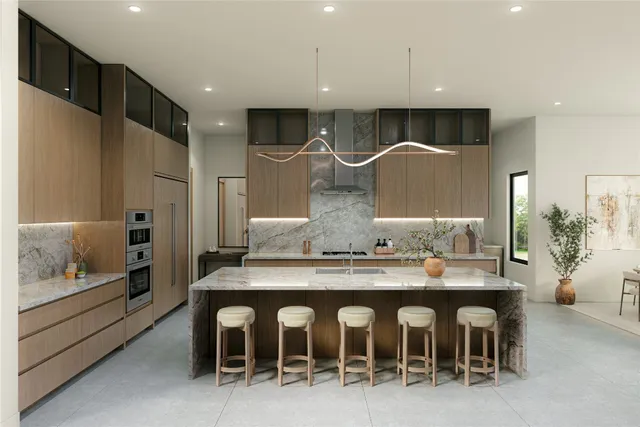 a kitchen with a table and chairs in it