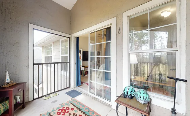 a view of a balcony and chair