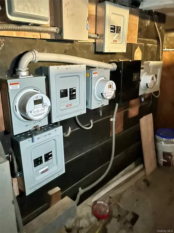 a utility room with sink dryer and washer