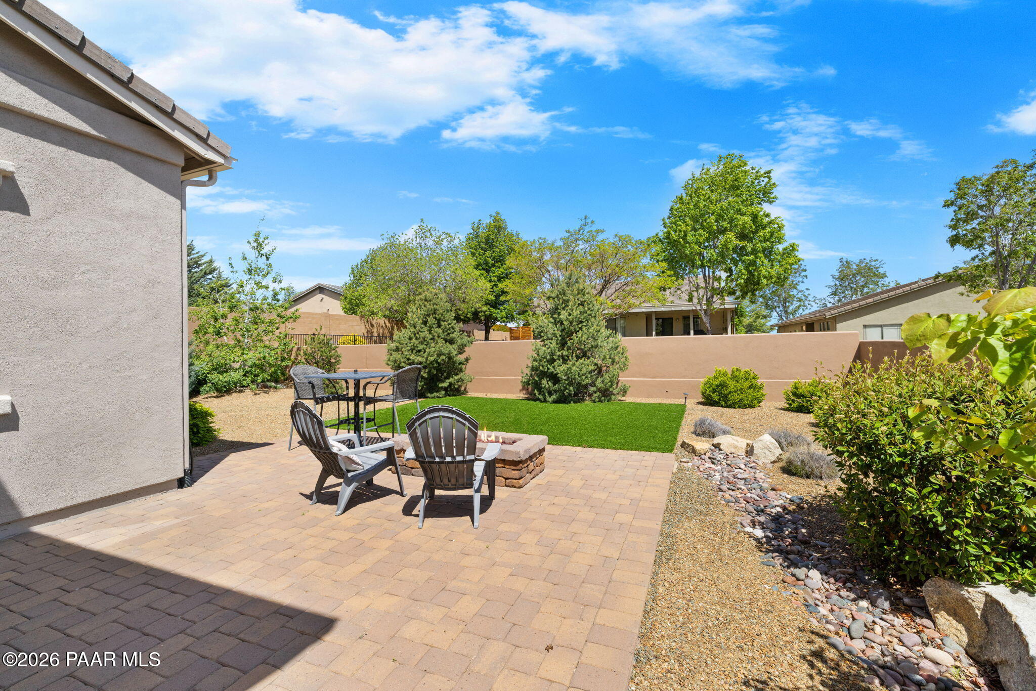 2792 Brooks Range Prescott, AZ 86301 - Photo 27 of 35 a view of a patio with table and chairs and potted plants