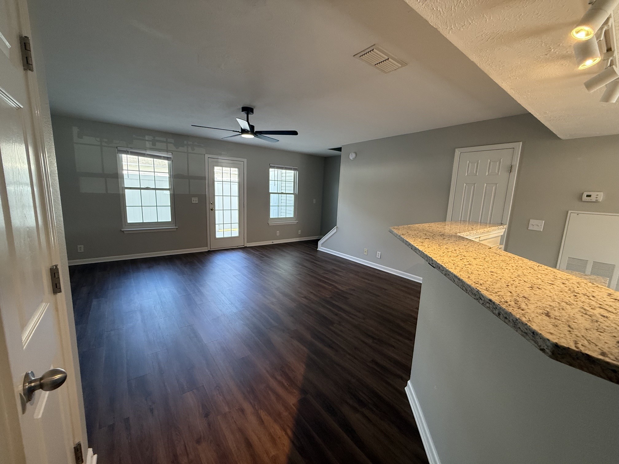 1026 Wolves Den Place Murfreesboro, TN 37128 - Photo 3 of 24 a view of an empty room with wooden floor and a window