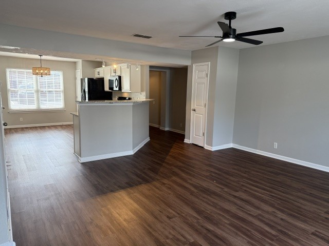 1026 Wolves Den Place Murfreesboro, TN 37128 - Photo 8 of 24 a view of kitchen with stainless steel appliances wooden floor and window
