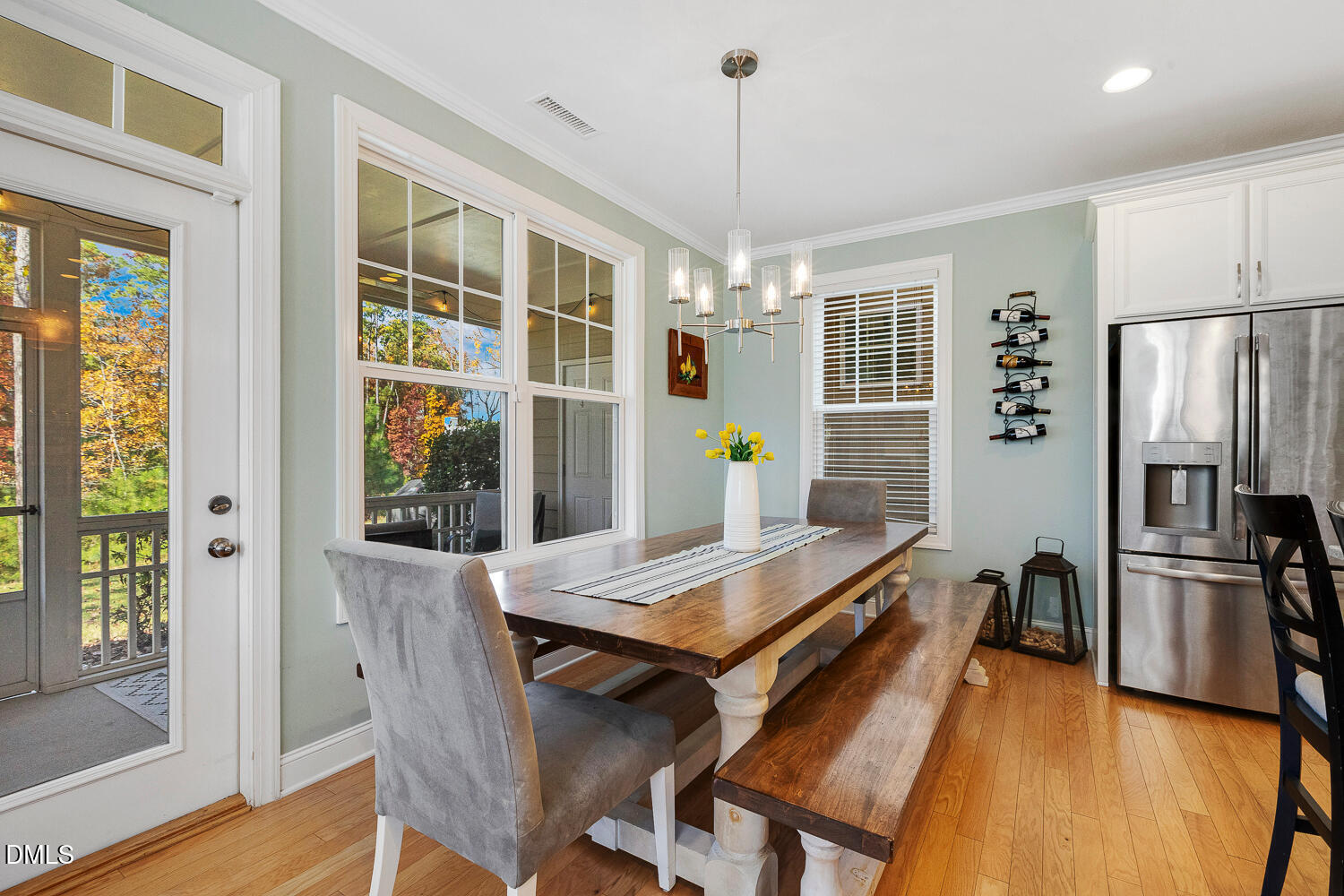 538 Rowanwood Way Apex, NC 27523 - Photo 14 of 40 a view of a dining room with furniture window and wooden floor