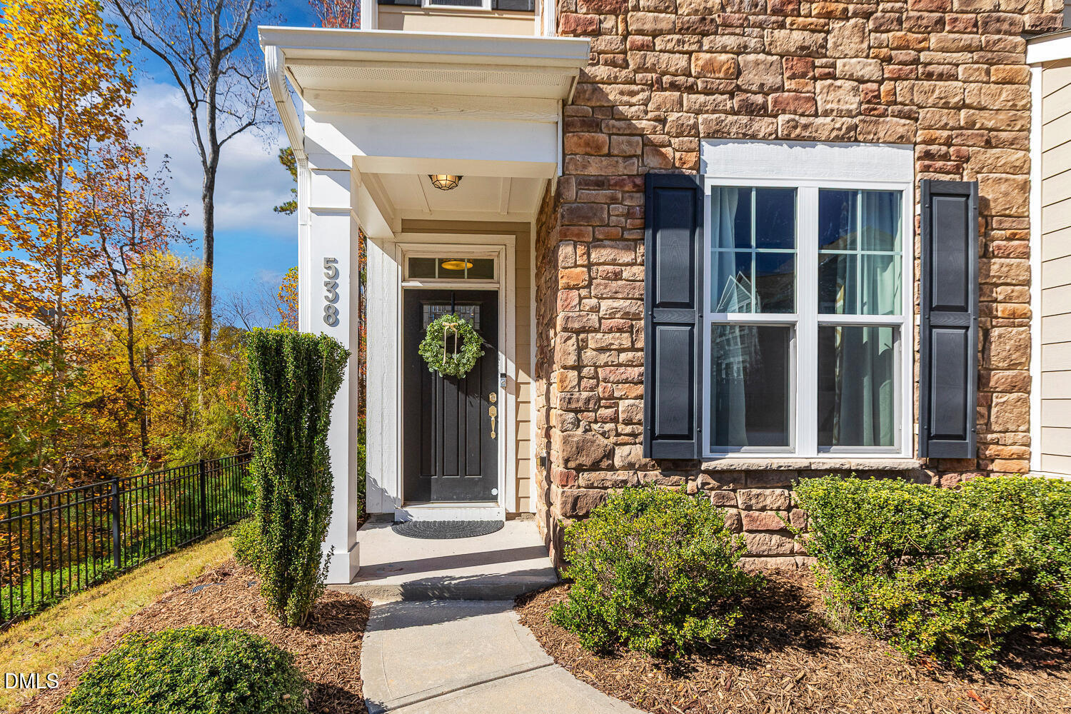 538 Rowanwood Way Apex, NC 27523 - Photo 2 of 40 a front view of a house with a garden