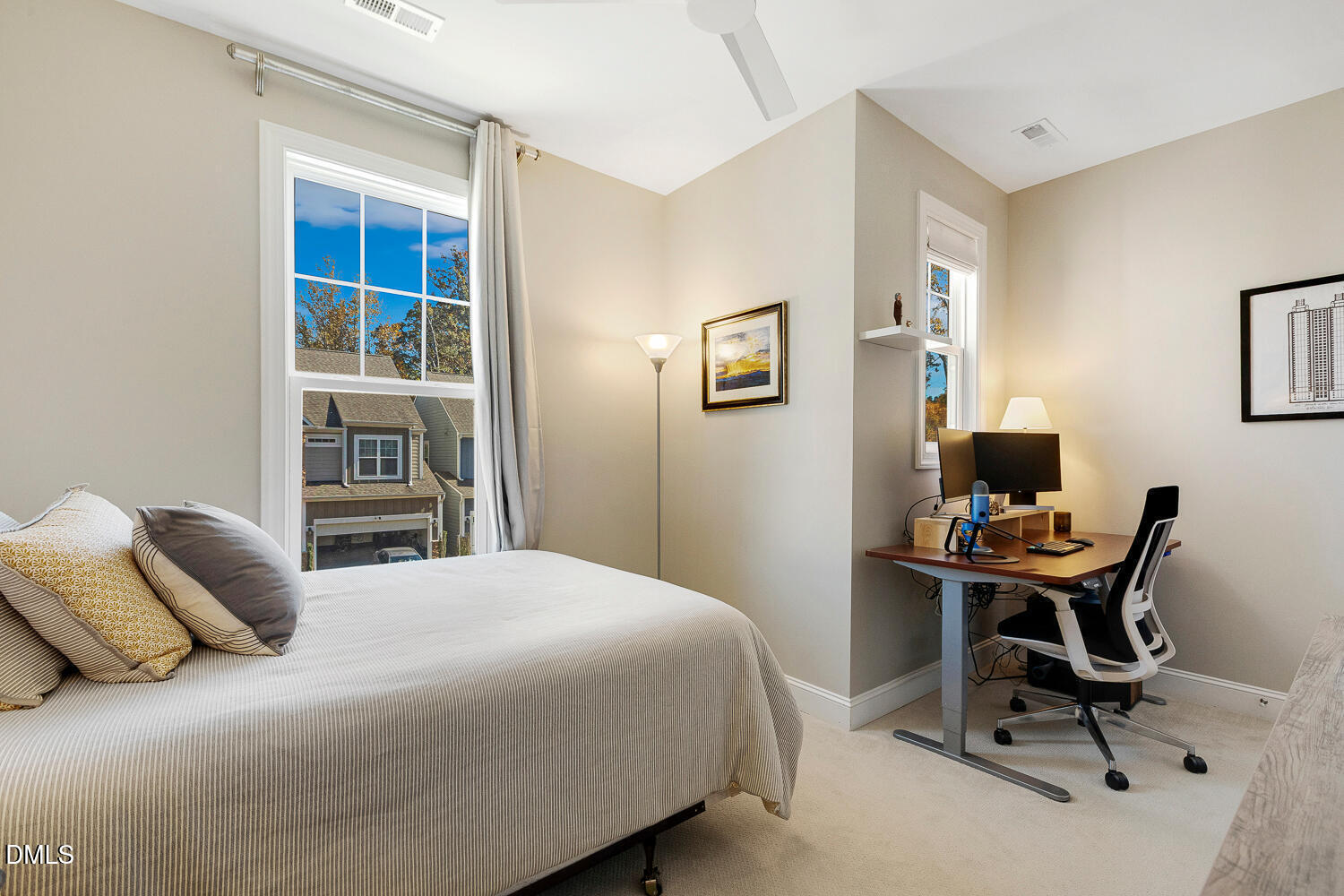 538 Rowanwood Way Apex, NC 27523 - Photo 24 of 40 a bedroom that has a bed and a desk in it