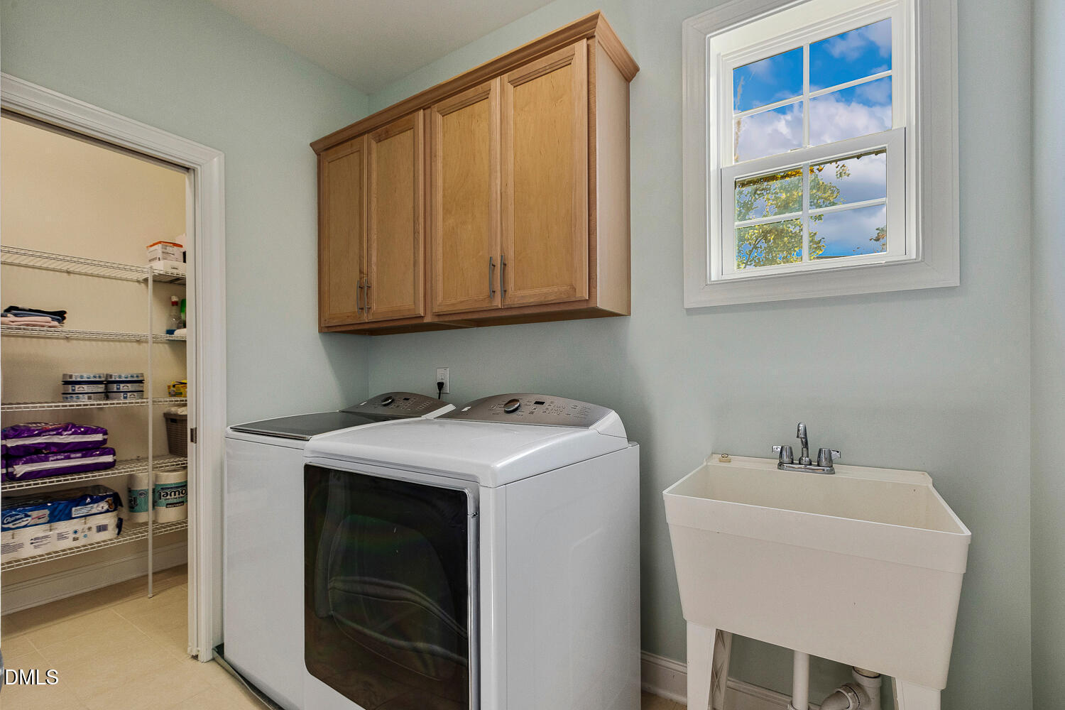 538 Rowanwood Way Apex, NC 27523 - Photo 29 of 40 a utility room with dryer and washer
