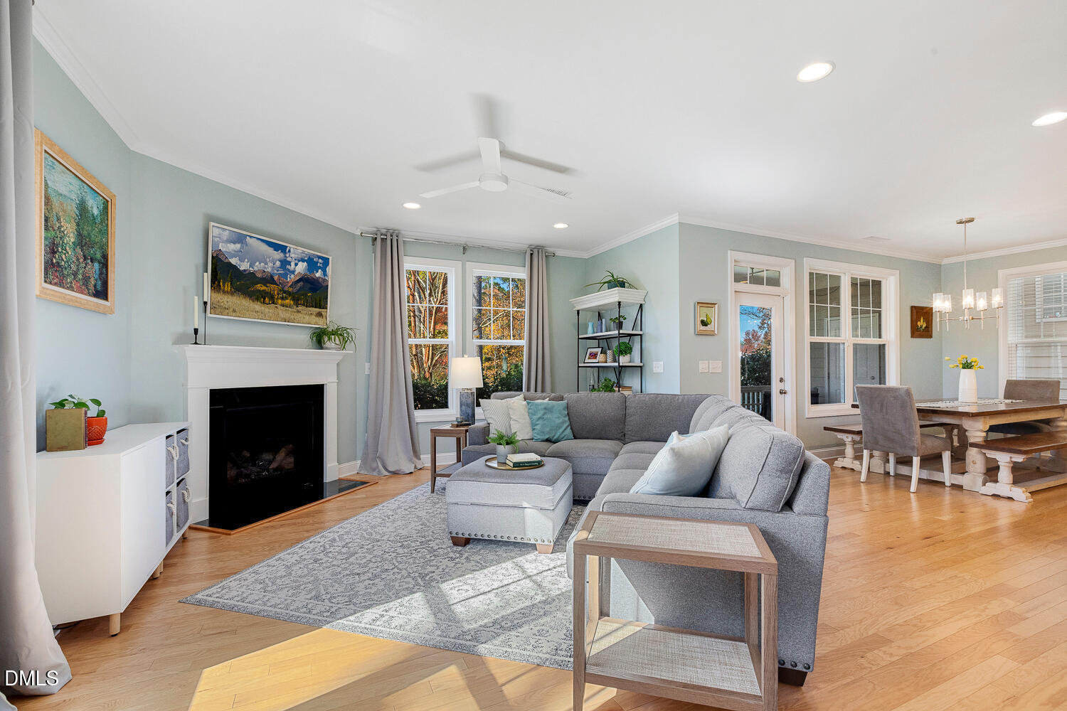 538 Rowanwood Way Apex, NC 27523 - Photo 6 of 40 a living room with furniture a fireplace with wooden floor