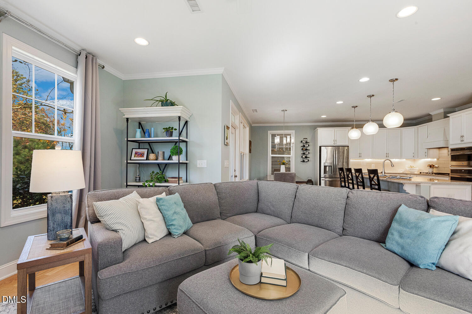 538 Rowanwood Way Apex, NC 27523 - Photo 8 of 40 a living room with furniture kitchen and a table