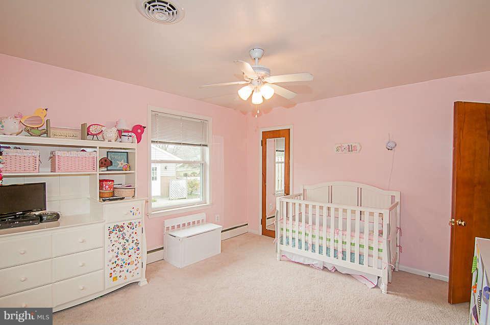 3721 Macalpine Road Ellicott City, MD 21042 - Photo 11 of 22 a bedroom with furniture and a window