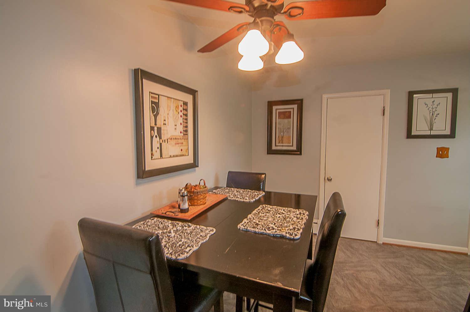 3721 Macalpine Road Ellicott City, MD 21042 - Photo 14 of 22 a view of a dining room with furniture