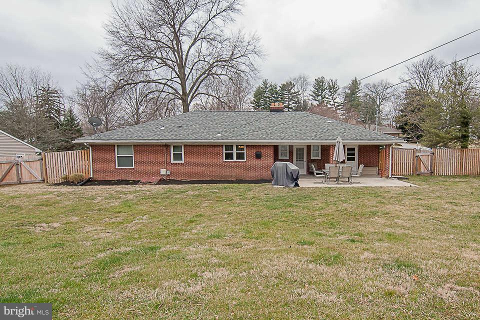 3721 Macalpine Road Ellicott City, MD 21042 - Photo 22 of 22 a front view of a house with a garden