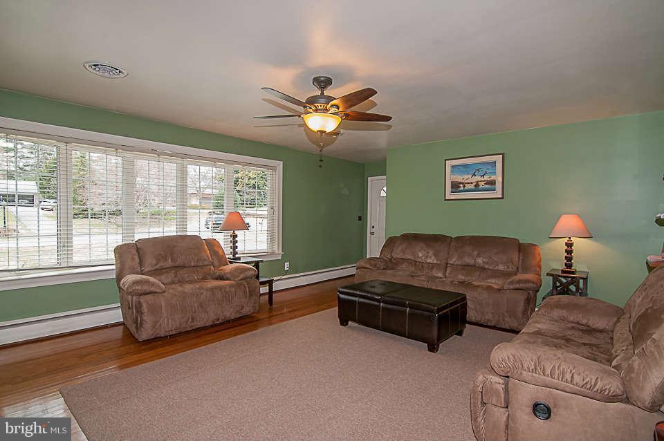 3721 Macalpine Road Ellicott City, MD 21042 - Photo 6 of 22 a living room with furniture and a large window