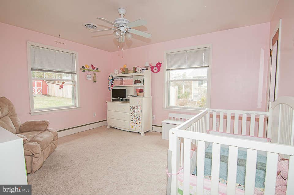 3721 Macalpine Road Ellicott City, MD 21042 - Photo 10 of 22 a bedroom with furniture and a window