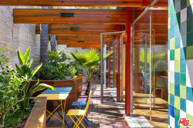 a view of swimming pool with seating area