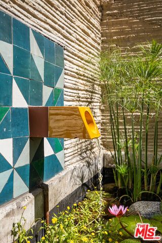 a view of a balcony with wooden floor