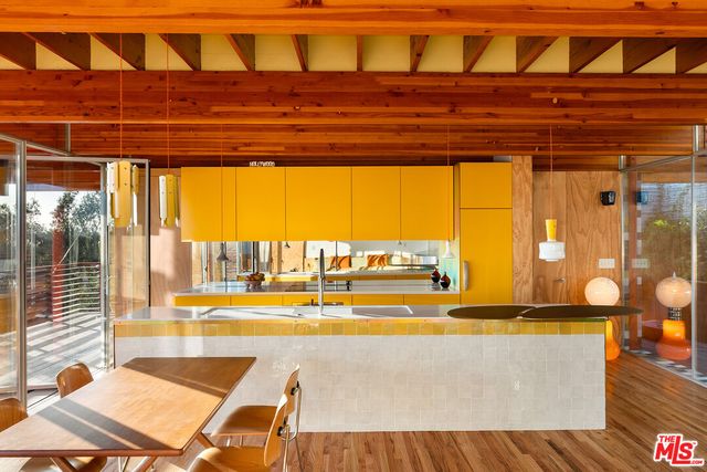 a view of a swimming pool with a lounge chairs