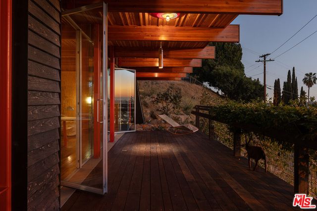 a view of a balcony with an outdoor space