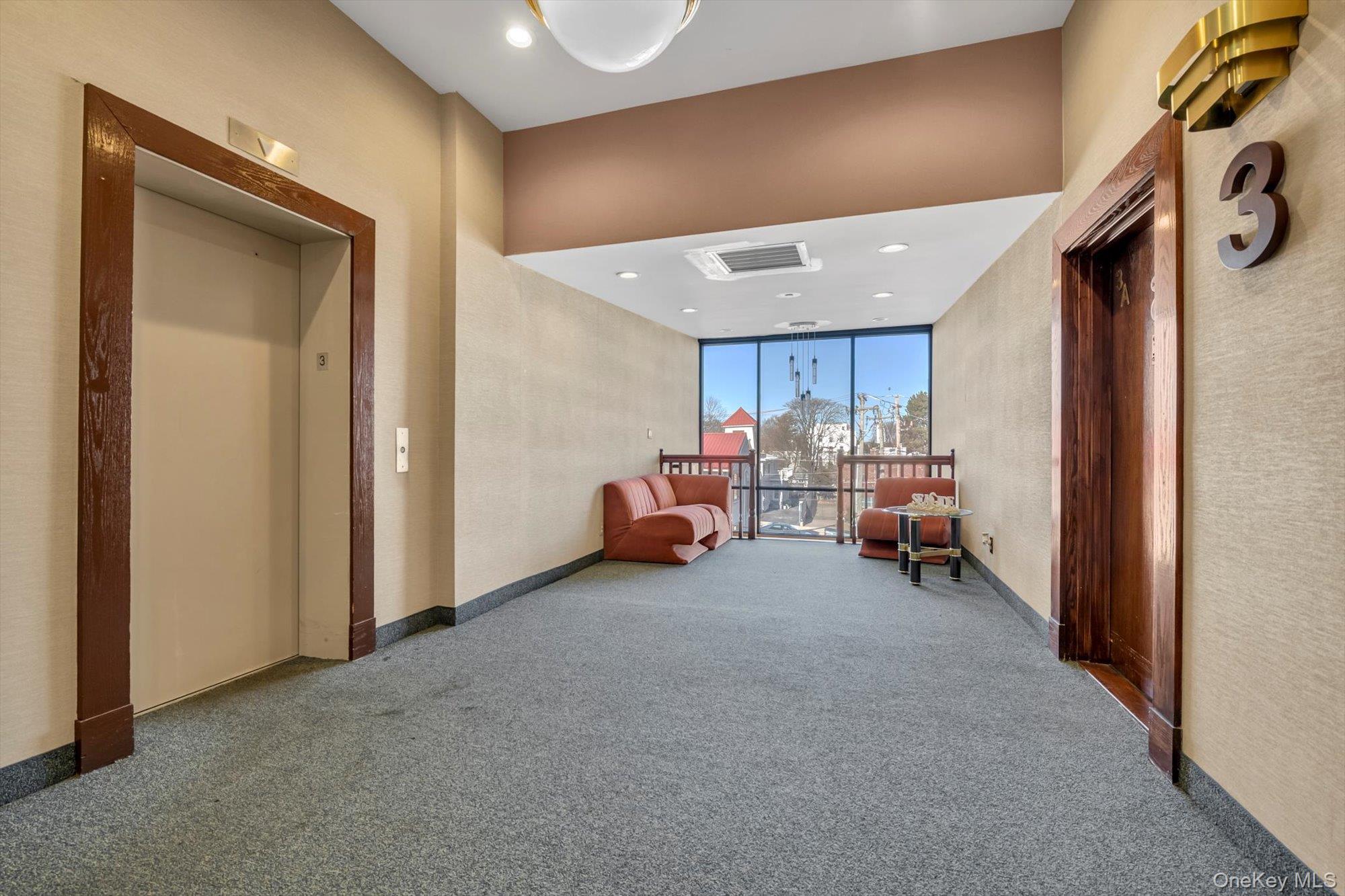 190 Schofield Street Bronx, NY 10464 - Photo 15 of 17 a living room with furniture and a window