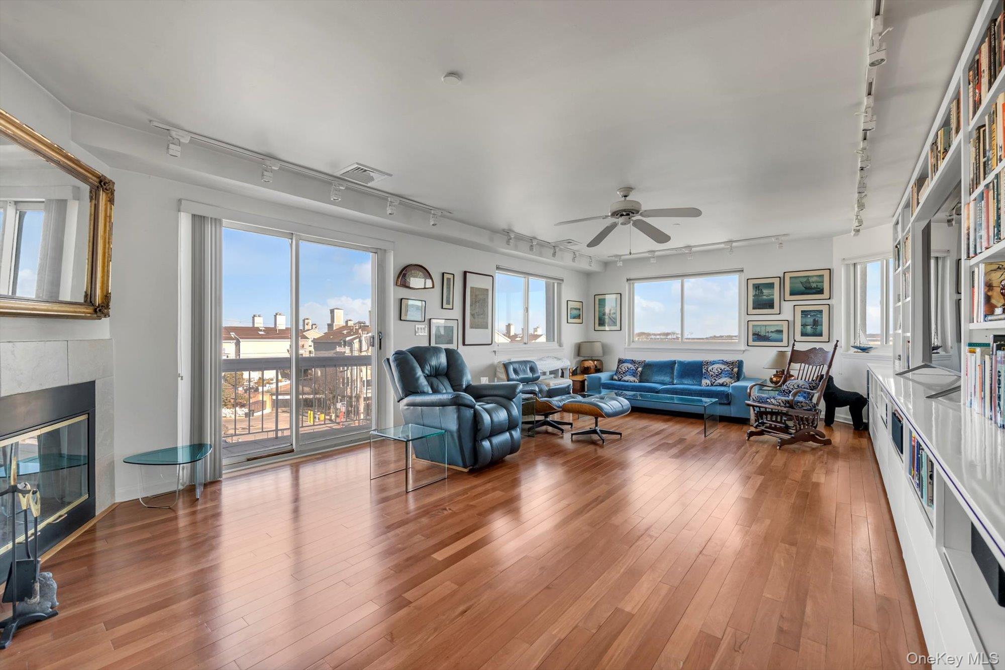 190 Schofield Street Bronx, NY 10464 - Photo 3 of 17 a living room with furniture and a wooden floor