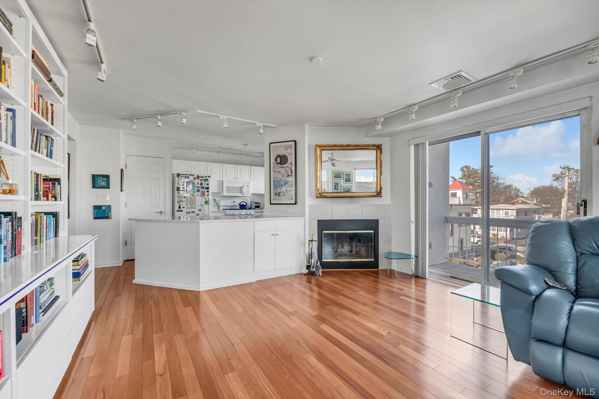 190 Schofield Street Bronx, NY 10464 - Photo 7 of 17 a living room with furniture and a fireplace