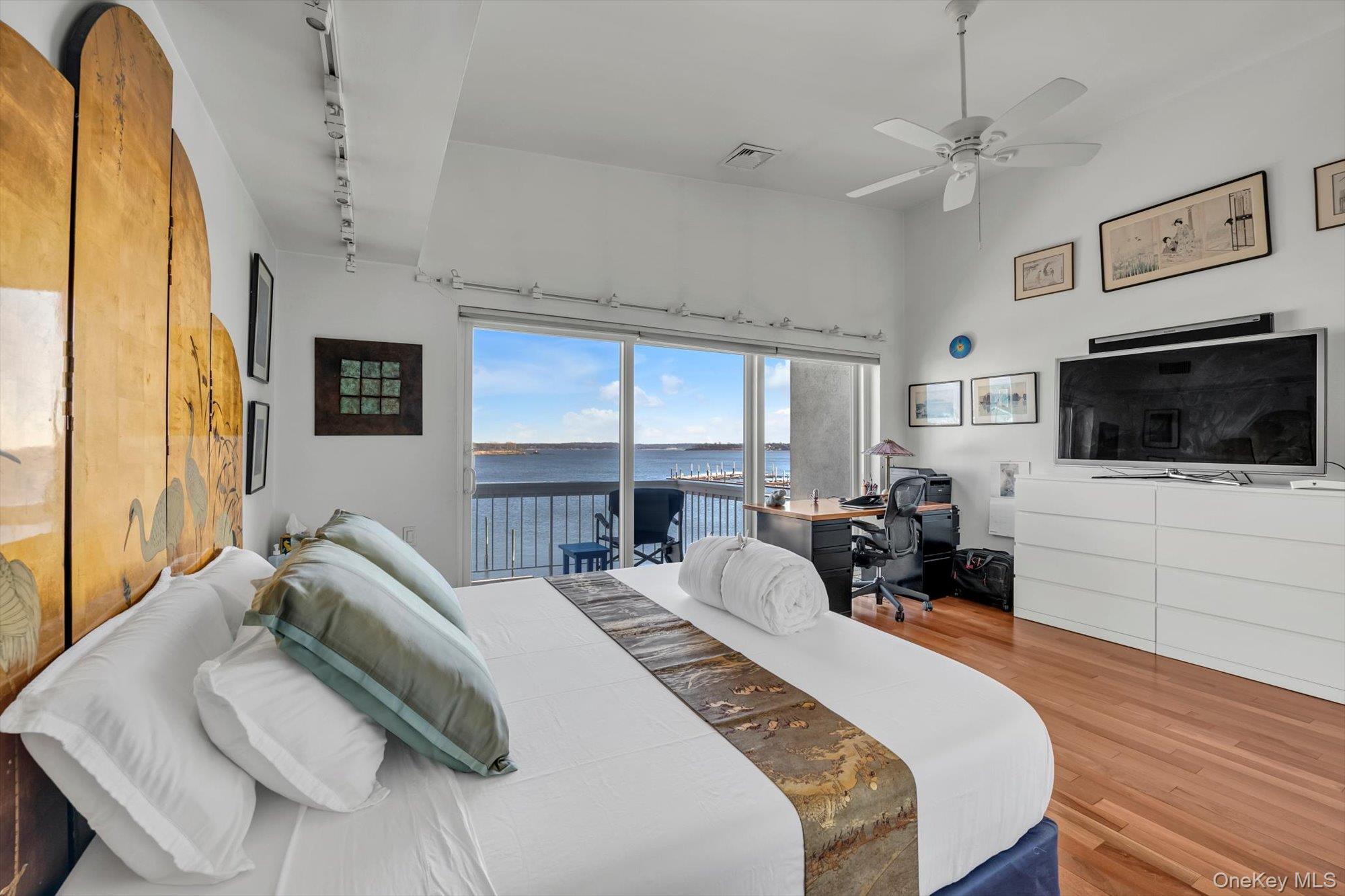 190 Schofield Street Bronx, NY 10464 - Photo 9 of 17 a bedroom with bed tv and window