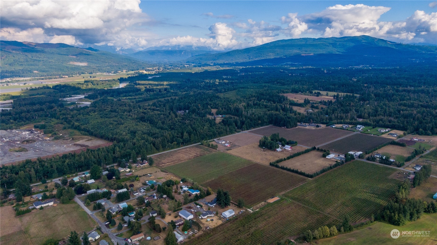 6573 Mission Road Everson, WA 98247 - Photo 15 of 40 an aerial view of residential houses with outdoor space