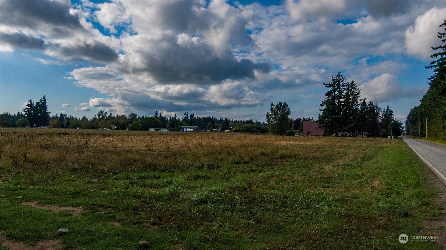 6573 Mission Road Everson, WA 98247 - Photo 3 of 40 a view of a lake with a yard