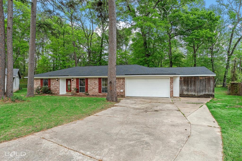 9471 Hemlock Circle Shreveport, LA 71118 - Photo 1 of 36 front view of a house with a yard