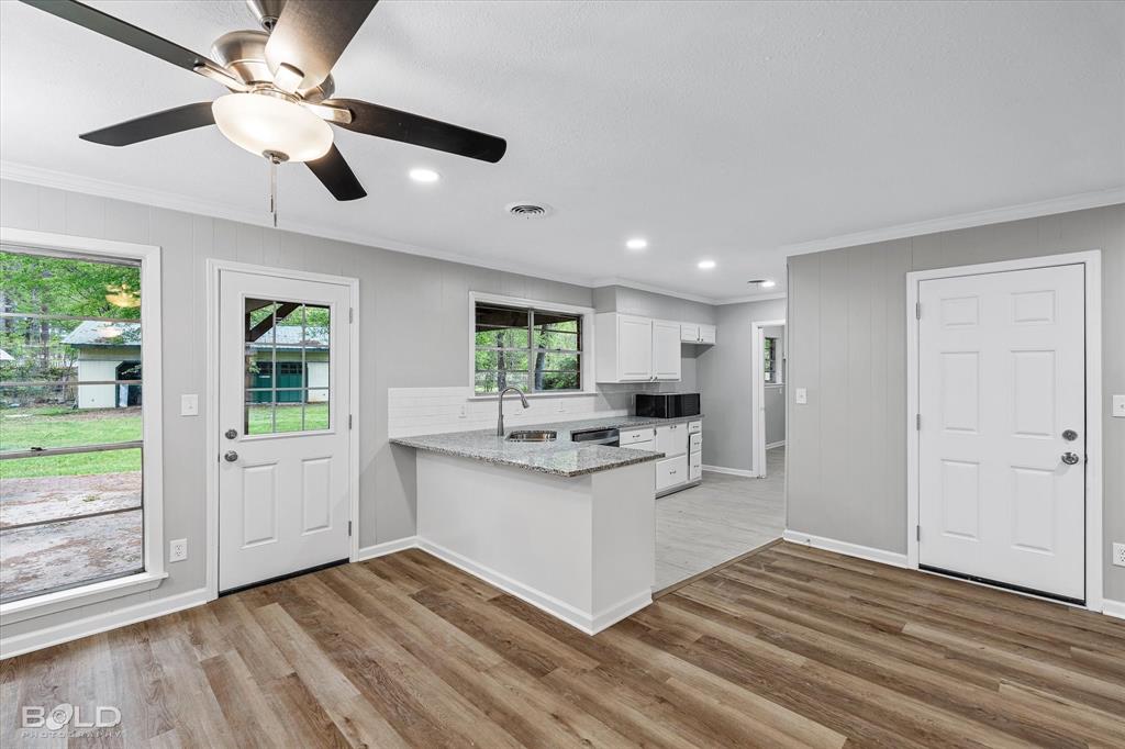 9471 Hemlock Circle Shreveport, LA 71118 - Photo 14 of 36 a kitchen with stainless steel appliances granite countertop a stove and a refrigerator