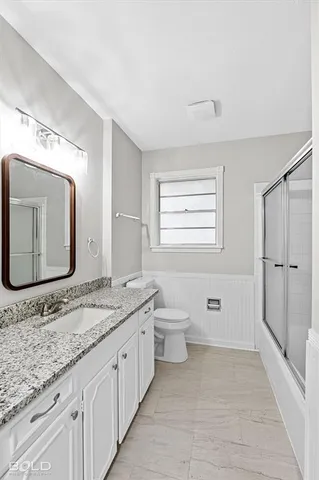 a view of a livingroom with wooden floor