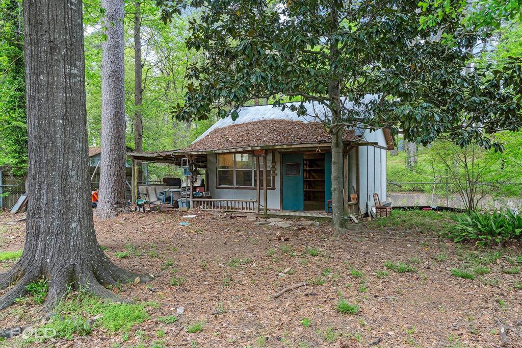 9471 Hemlock Circle Shreveport, LA 71118 - Photo 31 of 36 a backyard of a house with seating space