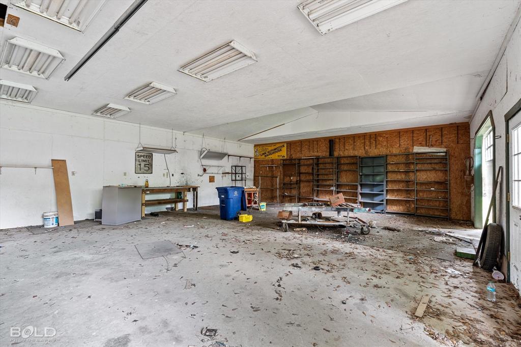 9471 Hemlock Circle Shreveport, LA 71118 - Photo 34 of 36 a view of a big room with air conditioner duct and materials on floor