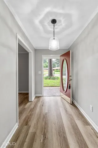 a view of a house with backyard and garden