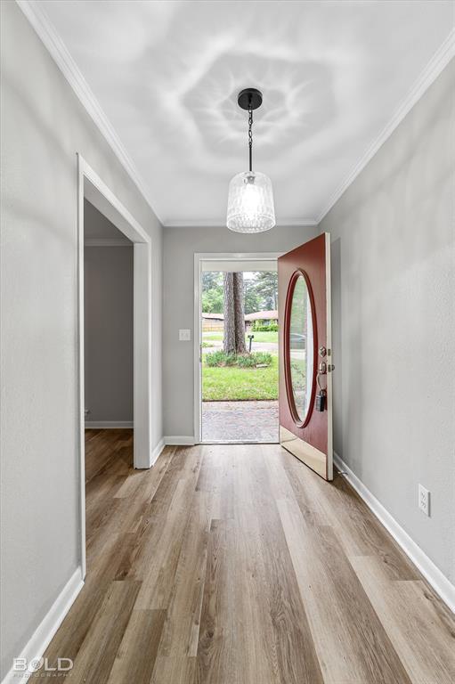 9471 Hemlock Circle Shreveport, LA 71118 - Photo 7 of 36 a view of empty room with wooden floor and window