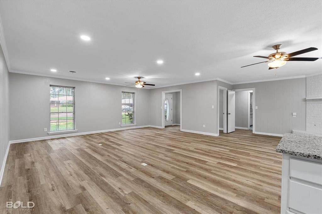 9471 Hemlock Circle Shreveport, LA 71118 - Photo 9 of 36 a view of an empty room with window and cabinet