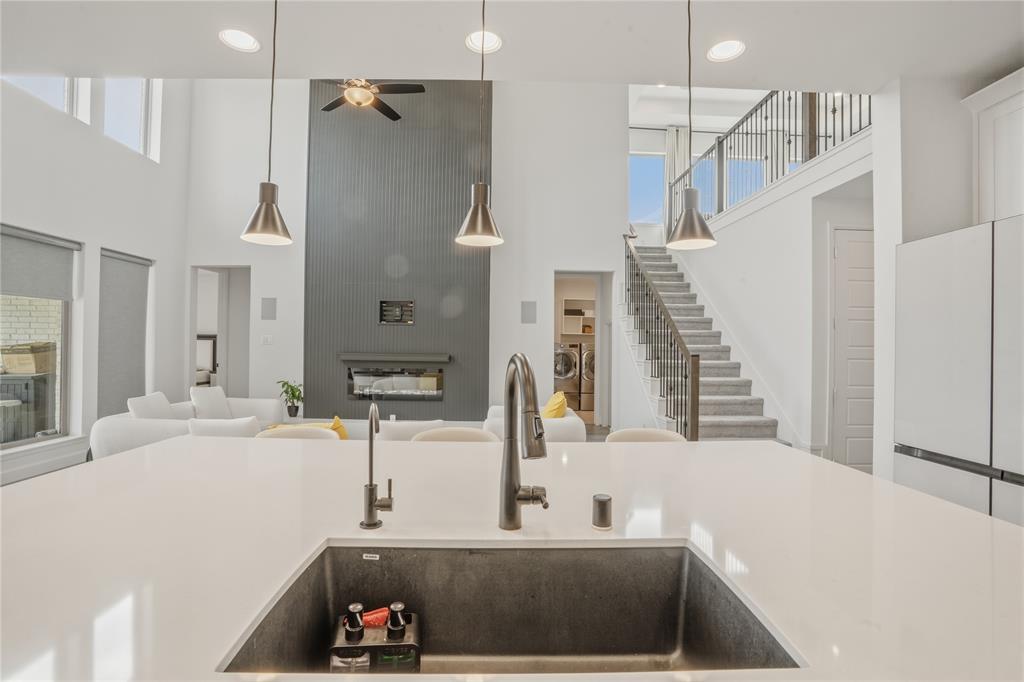 908 Maple Leaf Lane Haslet, TX 76052 - Photo 15 of 40 a bathroom with a sink and a large mirror