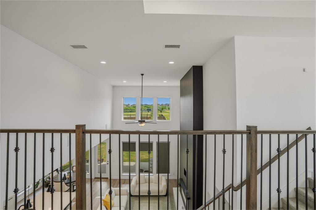 908 Maple Leaf Lane Haslet, TX 76052 - Photo 24 of 40 a view of staircase with railing and a window