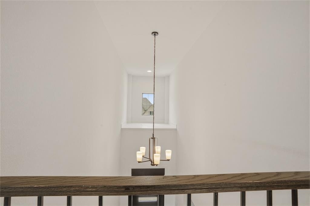 908 Maple Leaf Lane Haslet, TX 76052 - Photo 25 of 40 a table with a vase of flowers on it