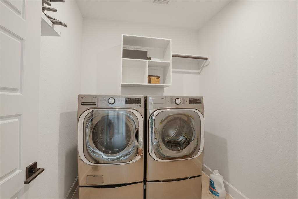 908 Maple Leaf Lane Haslet, TX 76052 - Photo 32 of 40 a utility room with dryer and washer