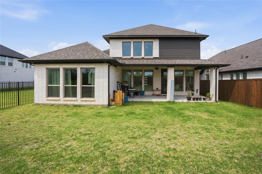 908 Maple Leaf Lane Haslet, TX 76052 - Photo 33 of 40 a house view with a garden space