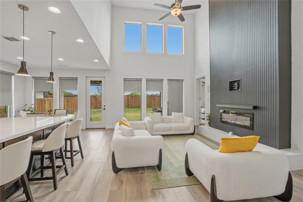 908 Maple Leaf Lane Haslet, TX 76052 - Photo 8 of 40 a living room with furniture and wooden floor
