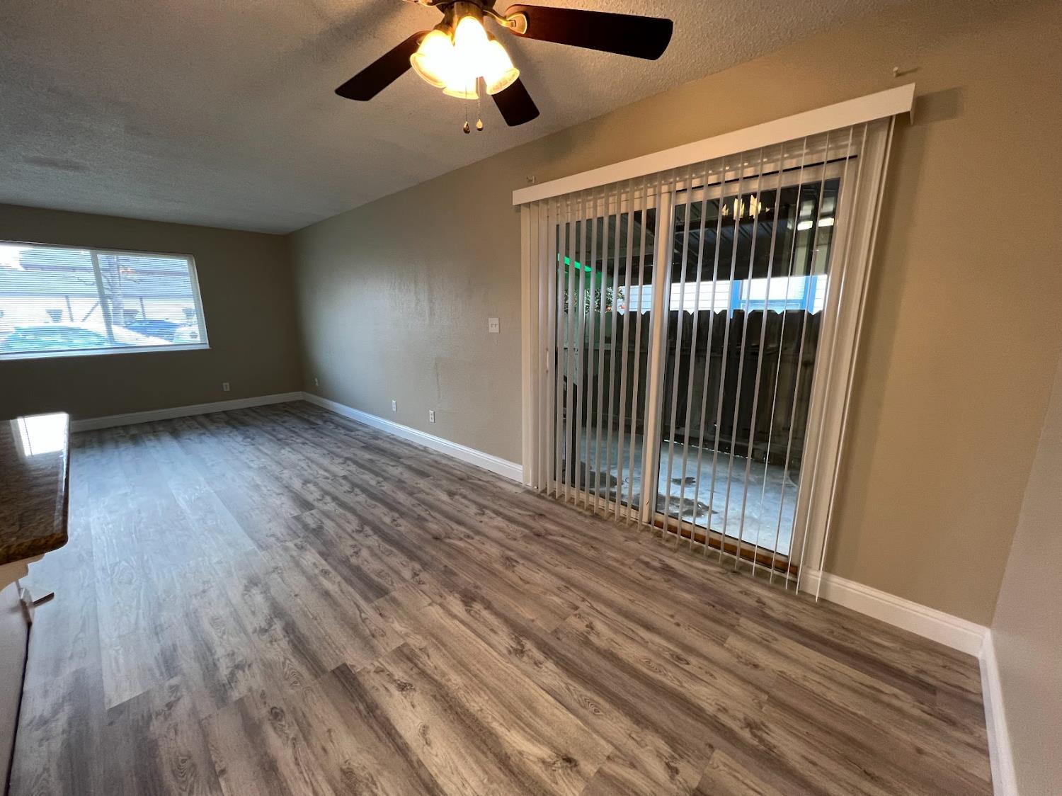 1205 F Street Reedley, CA 93654 - Photo 22 of 33 a view of entryway with wooden floor