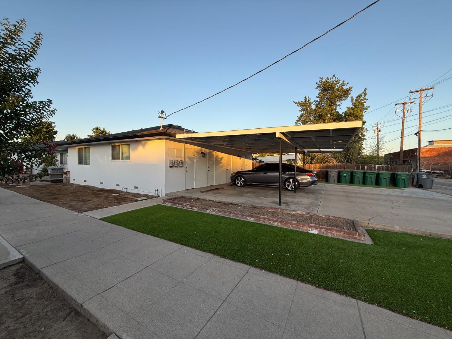 1205 F Street Reedley, CA 93654 - Photo 32 of 33 a view of a backyard with sitting area