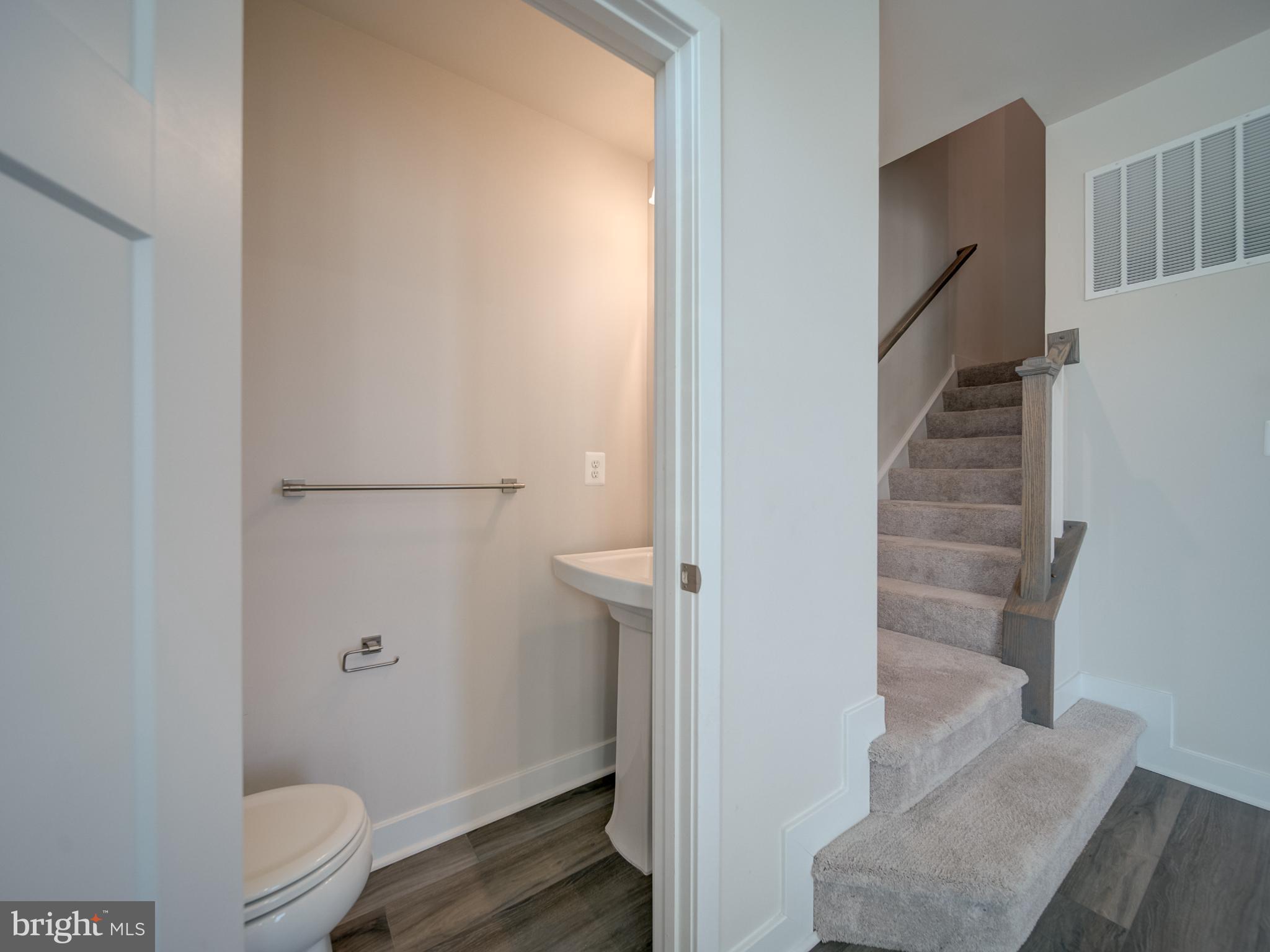 9502 Autumn Berry Place Montgomery Village, MD 20886 - Photo 20 of 36 a bathroom with a toilet and a shower