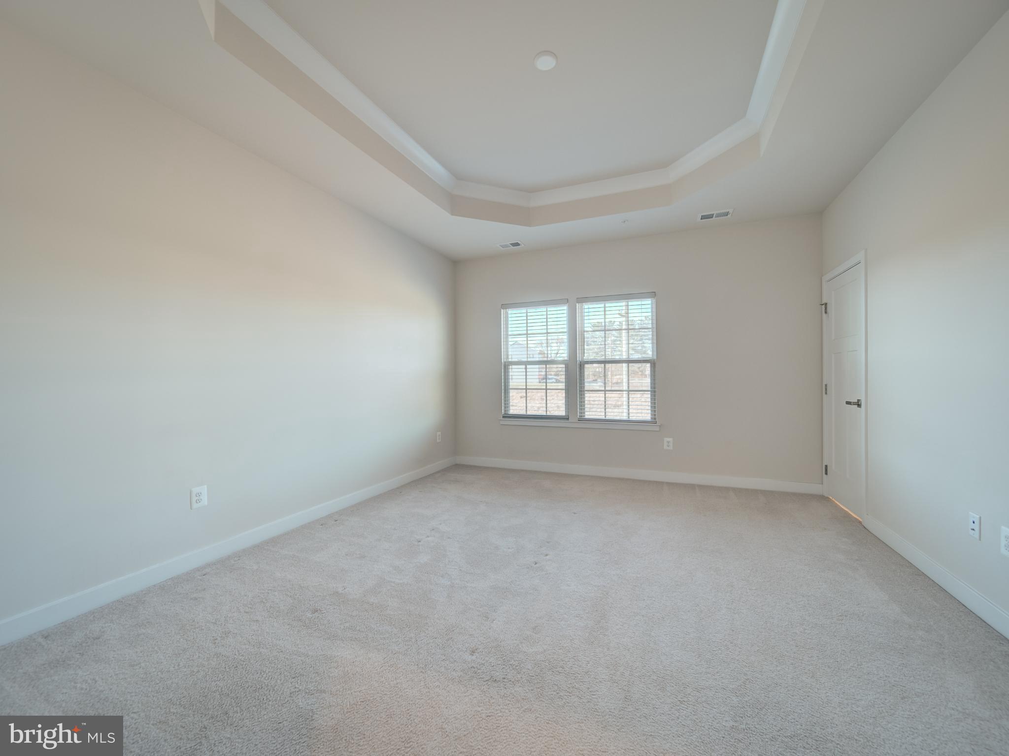 9502 Autumn Berry Place Montgomery Village, MD 20886 - Photo 24 of 36 an empty room with a window