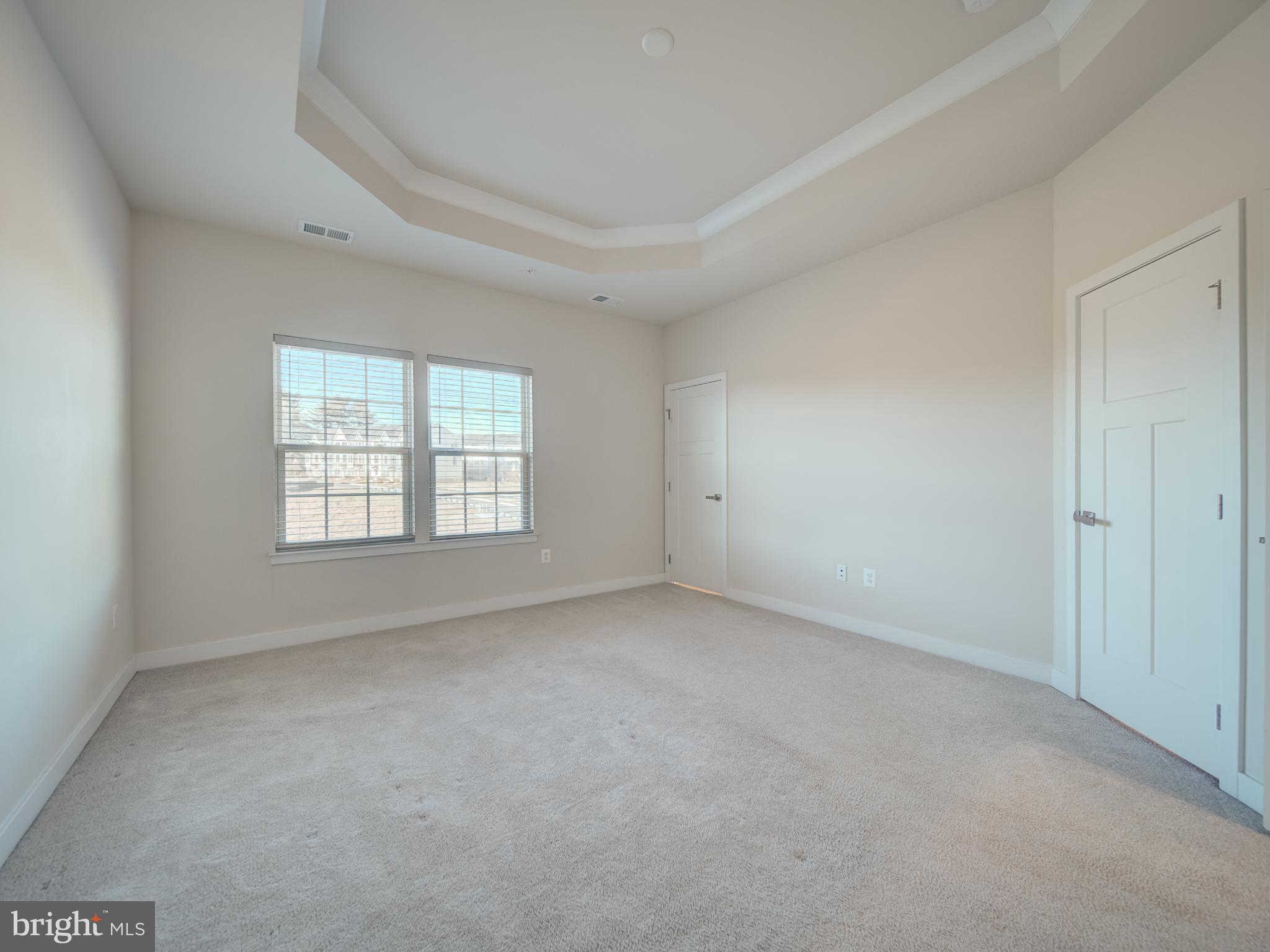 9502 Autumn Berry Place Montgomery Village, MD 20886 - Photo 25 of 36 an empty room with a window
