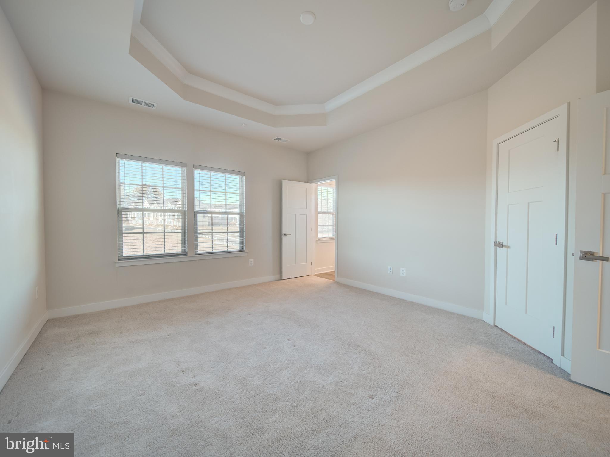 9502 Autumn Berry Place Montgomery Village, MD 20886 - Photo 26 of 36 an empty room with windows