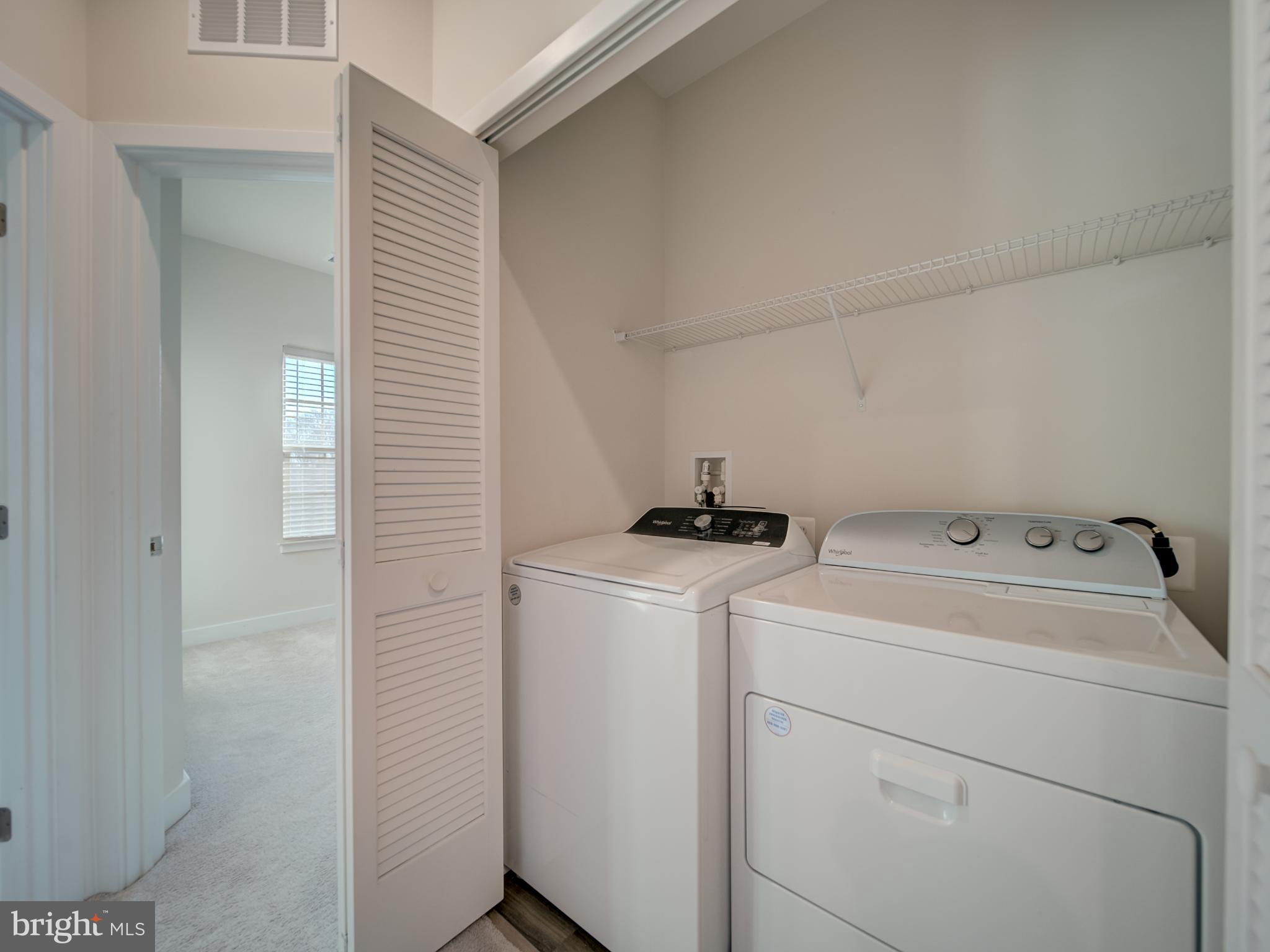9502 Autumn Berry Place Montgomery Village, MD 20886 - Photo 29 of 36 a utility room with dryer and washer