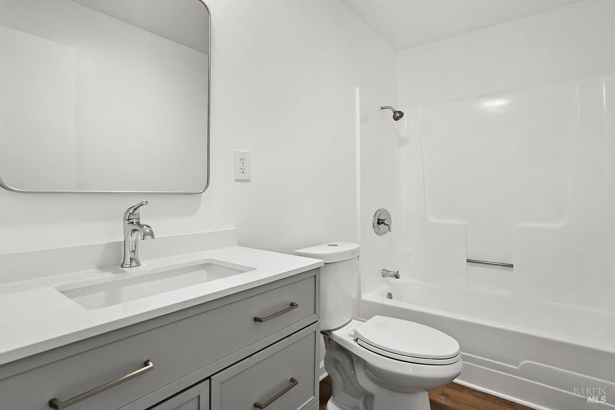 523 B Street San Rafael, CA 94901 - Photo 22 of 37 a bathroom with a sink a toilet and shower